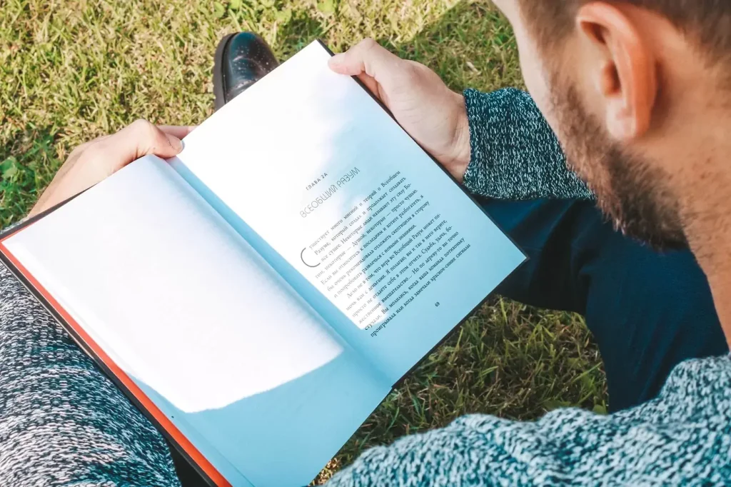 A reader with an open book