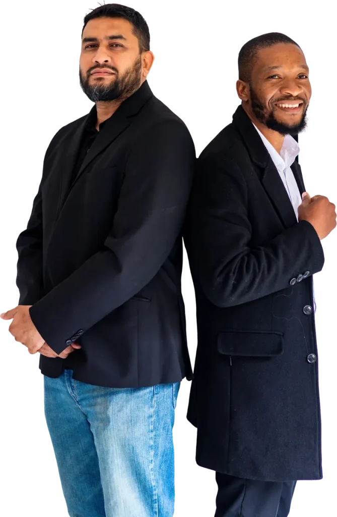 Two smiling professionals in jackets