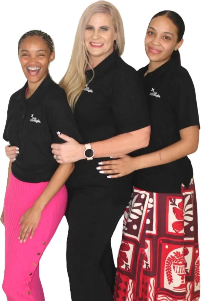 Three Dale Carnegie team members in branded polo shirts