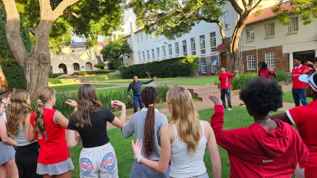 Generation.Next learners in an outdoor team activity